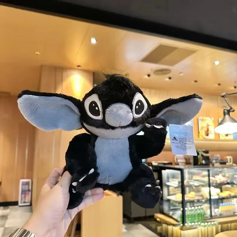 Plush toy with a tag held in front of a store interior, Lilo & Stitch Black Stitch Plush Doll Gothic Style