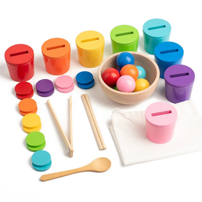 Colorful educational toys including sorting cups, beads, and wooden sticks on a white background