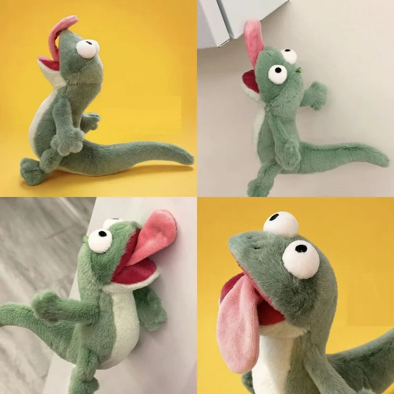 Plush toy lizard with a red tongue on a yellow and white background