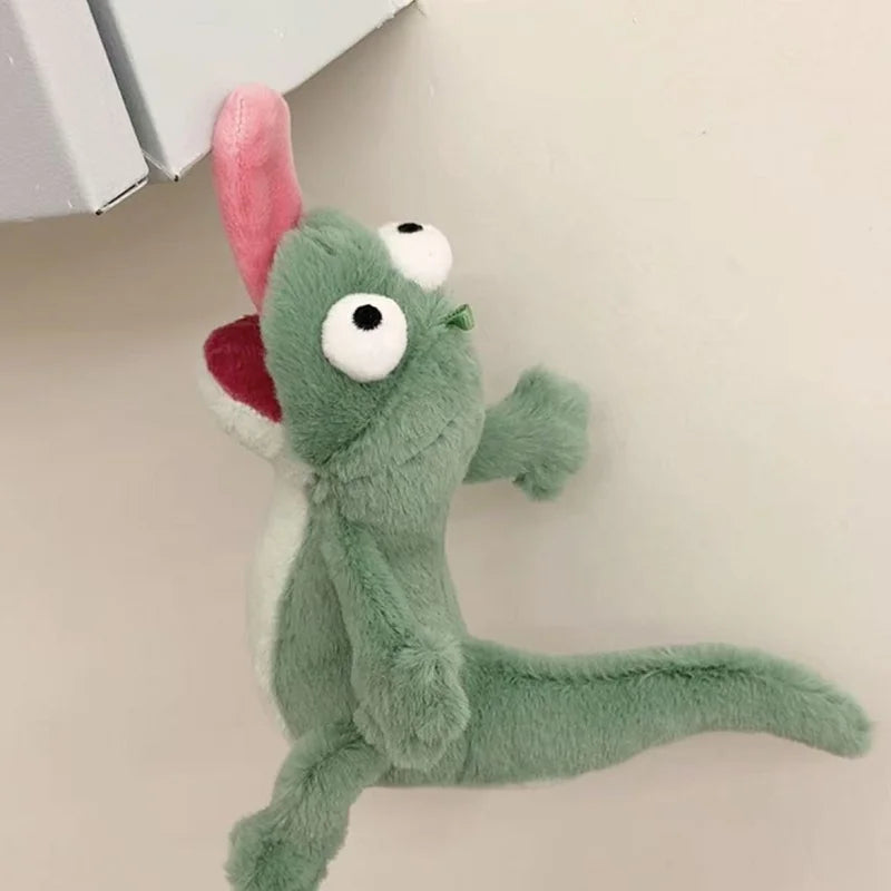 Hoppers plush toy with a red tongue on a beige surface