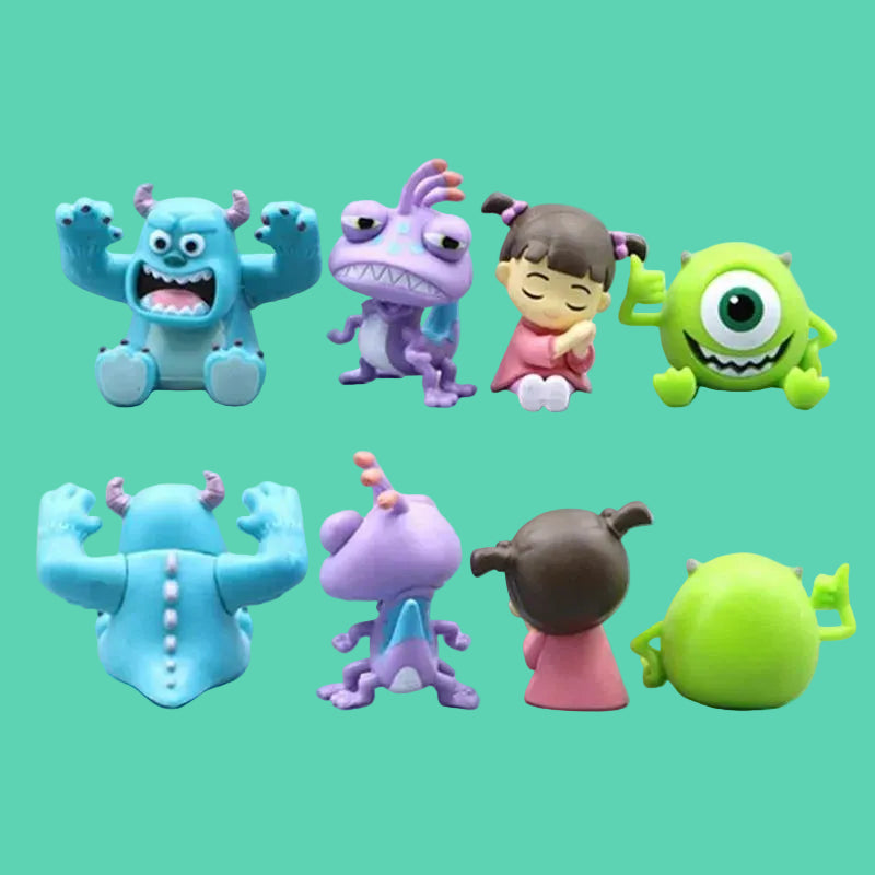 Set of monster university toy figures on a light gray background