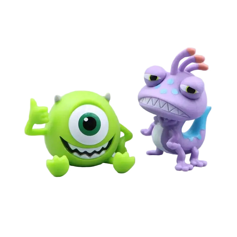 Two cartoon-like monster mini collectible toys, one green and one purple with a blue patch, on a light gray background.
