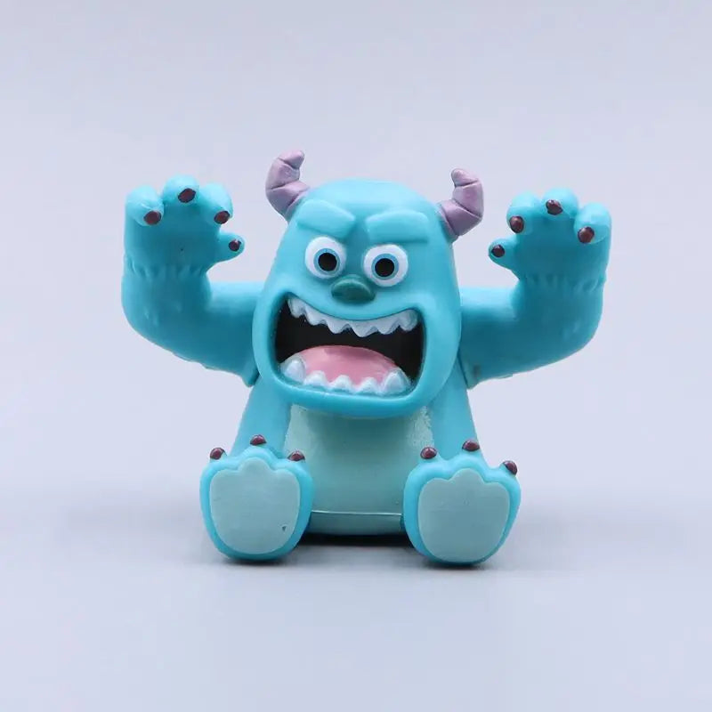 Toy figure of a blue monster with a surprised expression on a light gray background