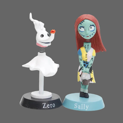 Two animated character figurines, Zero and Sally, on stands with labels on a white background.
