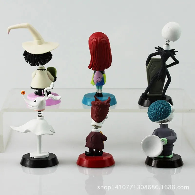 Set of animated character figurines on a white background