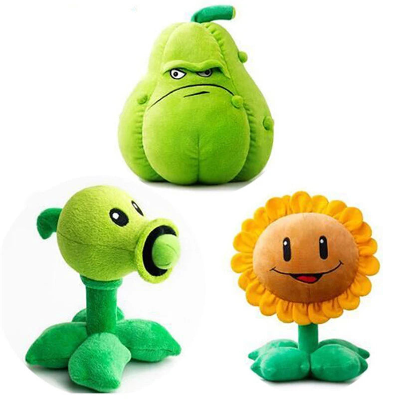 Three plush toys: a green bean plant, a sunflower, and a green snail on a white background.