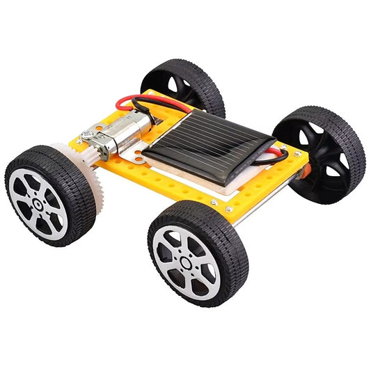Solar-powered car kit with yellow frame, black wheels, and solar panel on a white background