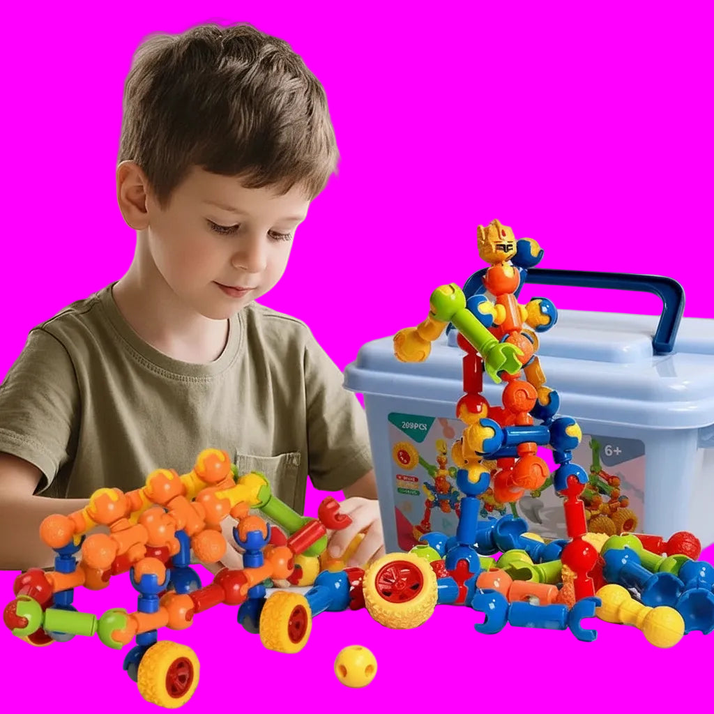 Child playing with colorful skeleton building blocks on a table.