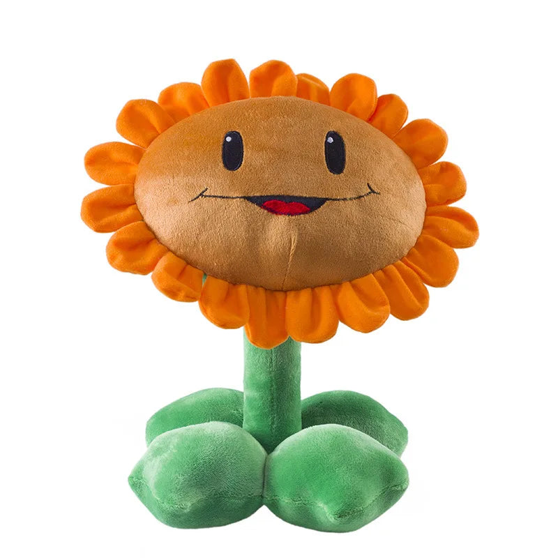 Plush toy resembling a sunflower with a smiling face on a white background