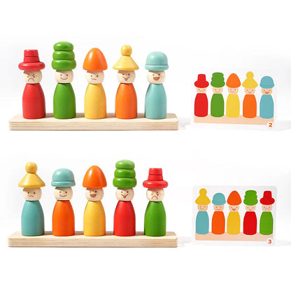 Set of colorful wooden peg dolls with different colored hats on a white background
