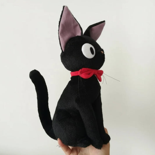 Black cat plush toy with a red bow tie on a white background, mytoyora toys
