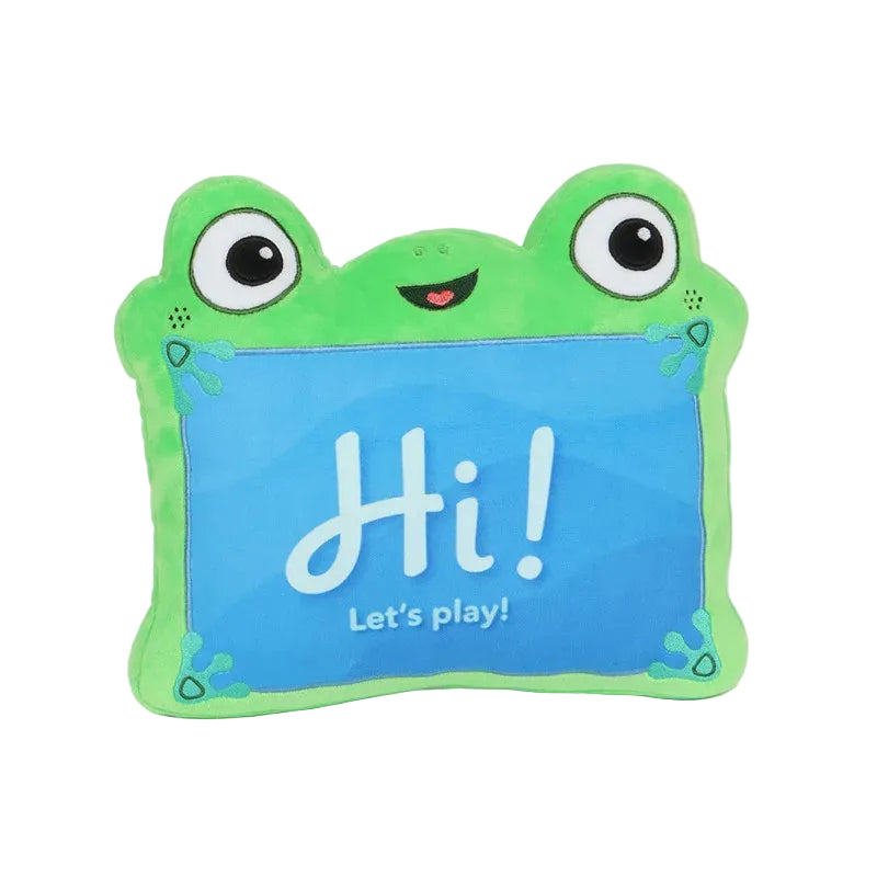 A green plush frog-shaped lily pad toy pillow with large cartoon eyes and a smiling mouth, holding a blue sign that reads 'Hi! Let's play!' in white text, photographed on a clean white background.